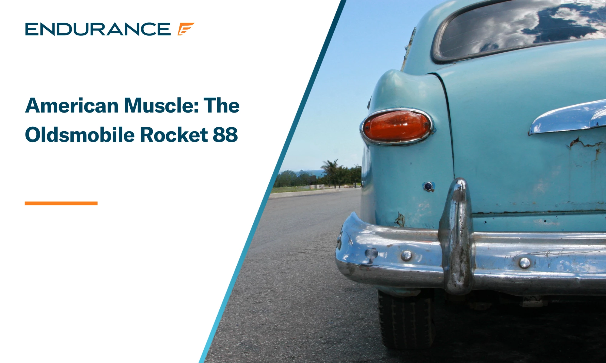 An rusty Oldsmobile parked on a road