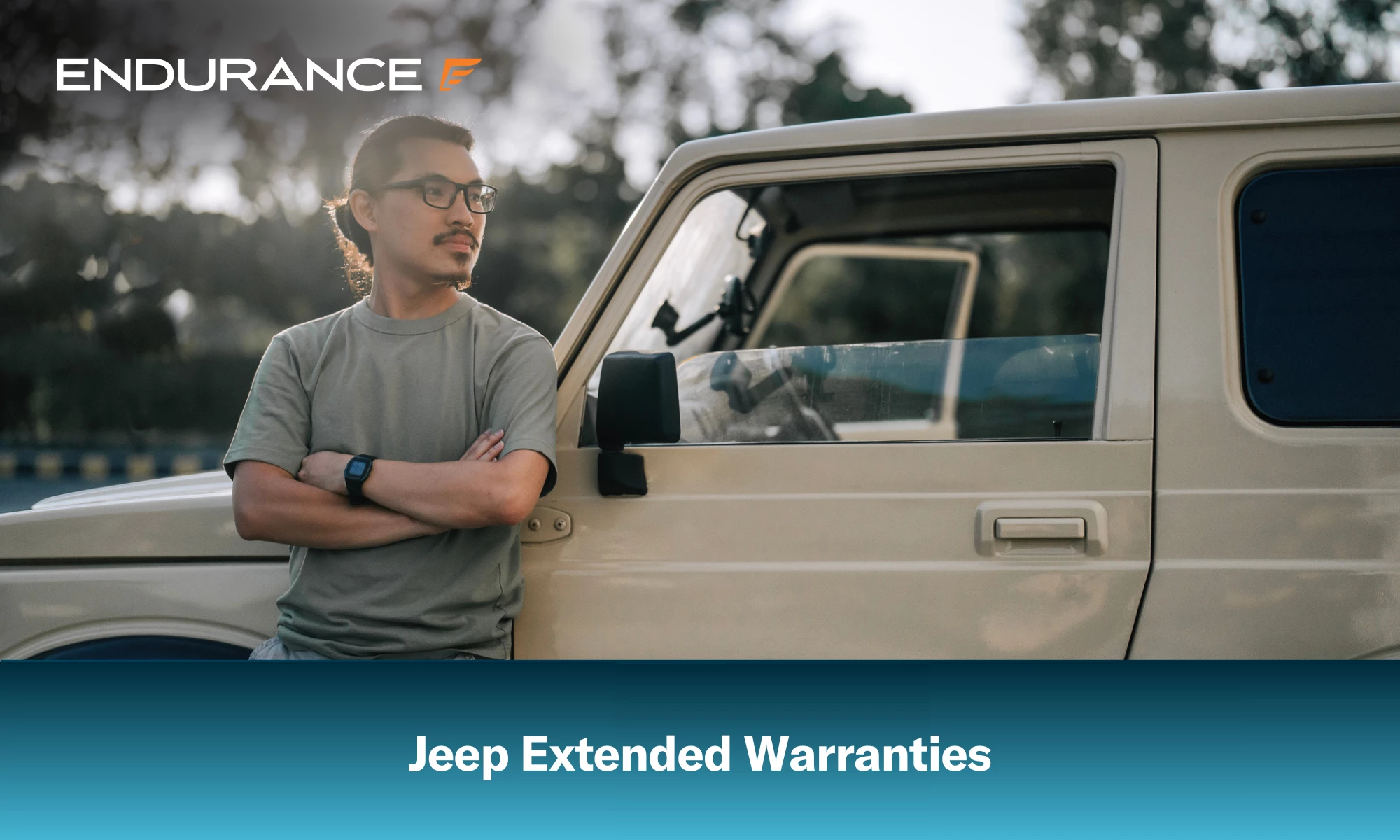 Man standing in front of a Jeep with his arms crossed