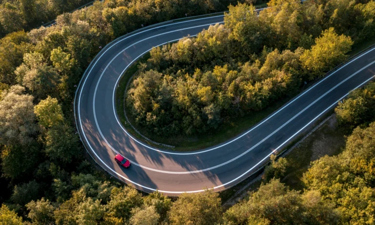 A car driving down a winding highway