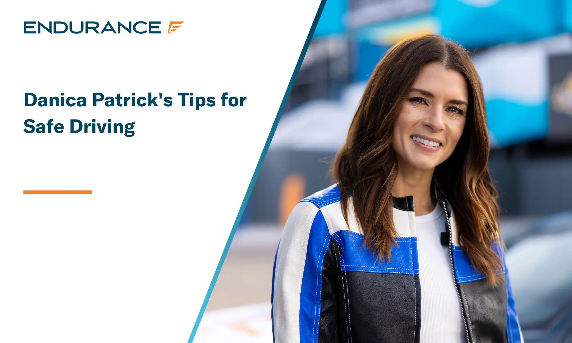 Danica Patrick standing on a racetrack wearing a leather jacket