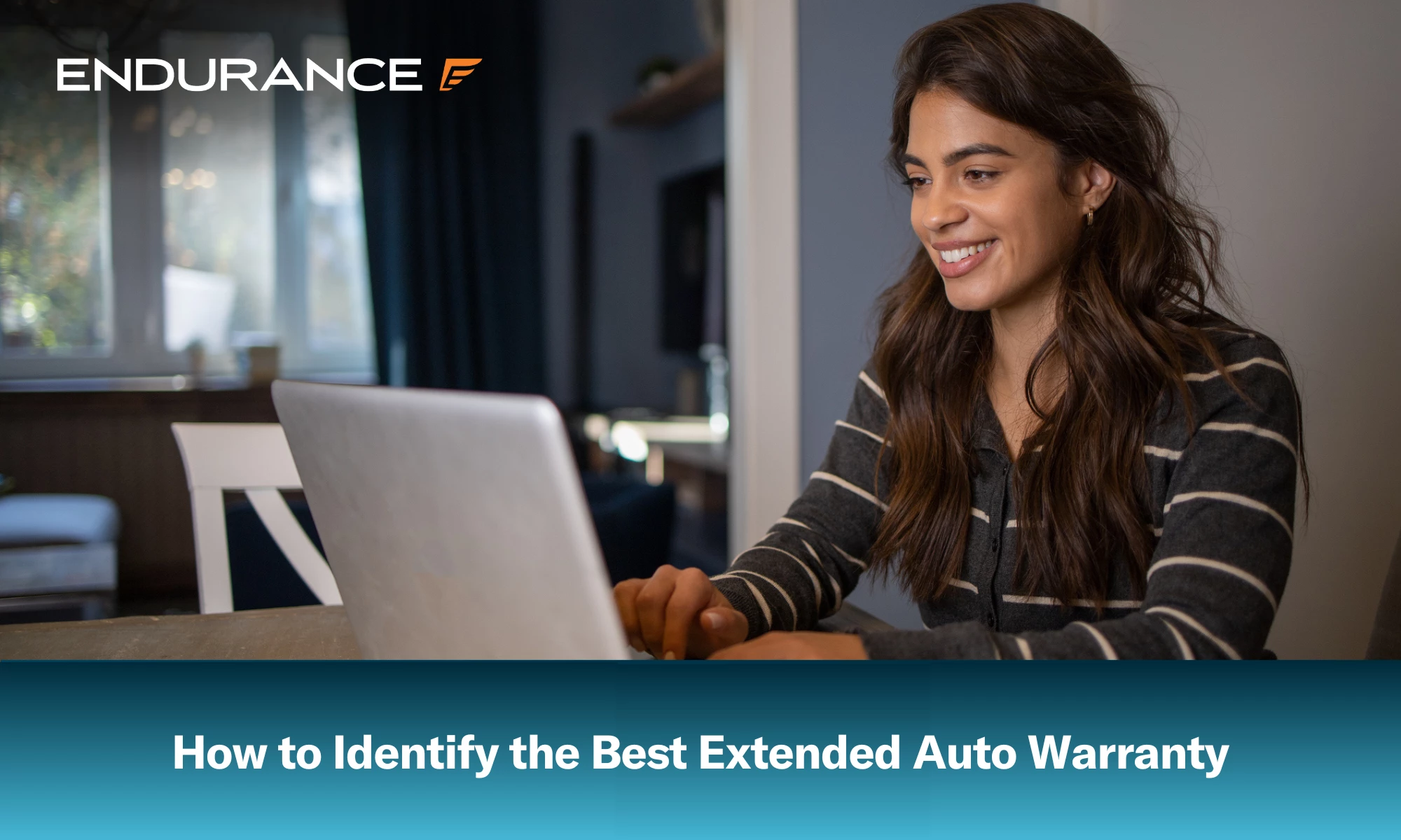 Woman at home on her laptop looking at extended warranty providers