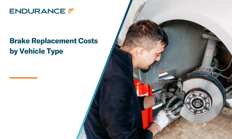 Car mechanic working on repairs to replace brakes in a garage