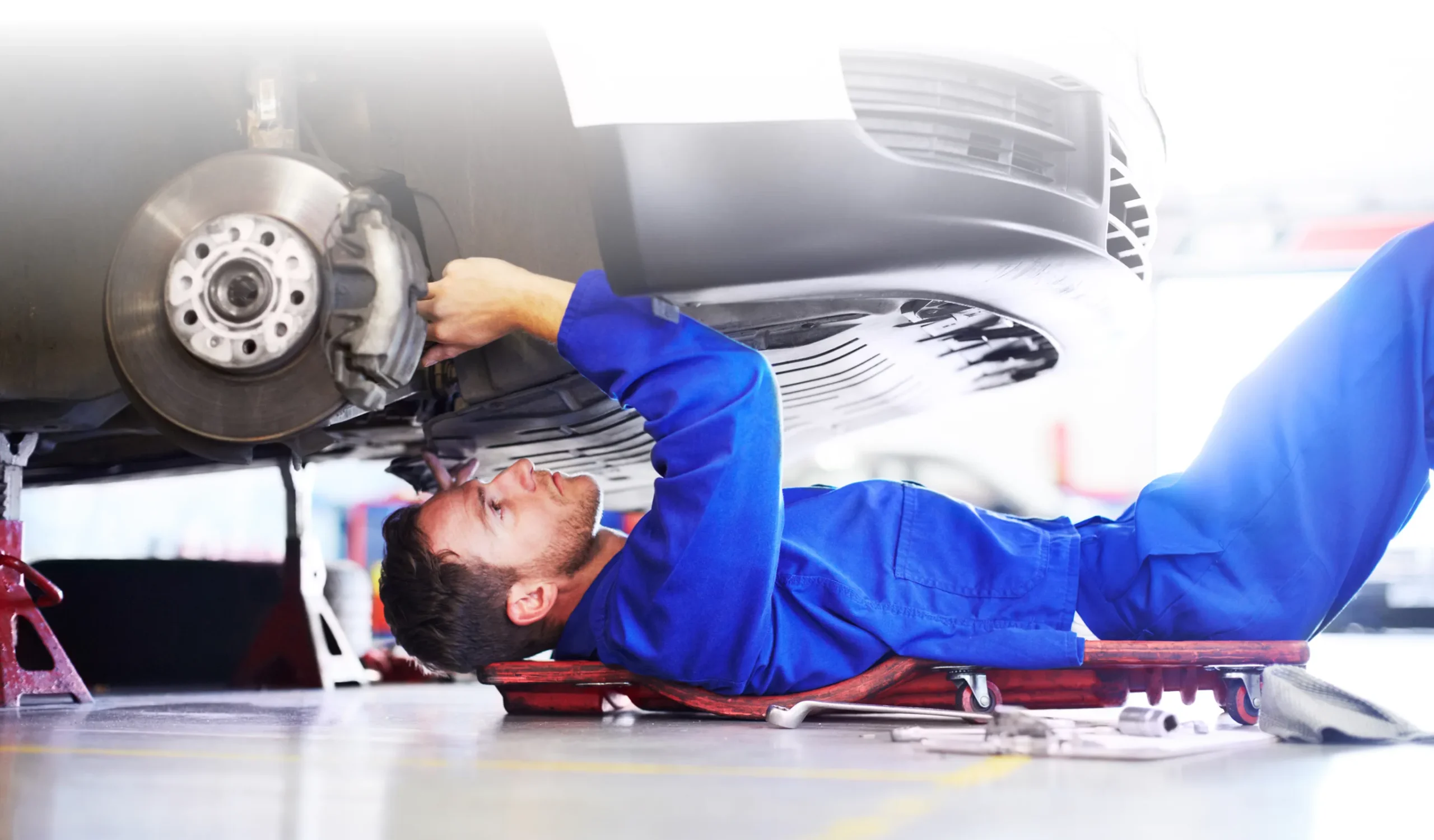 Mechanic working on vehicle