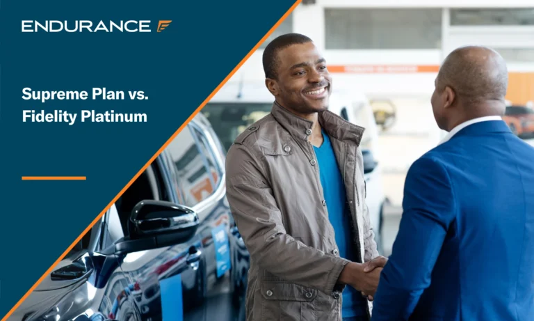 Happy African American man buying a new vehicle at a dealership