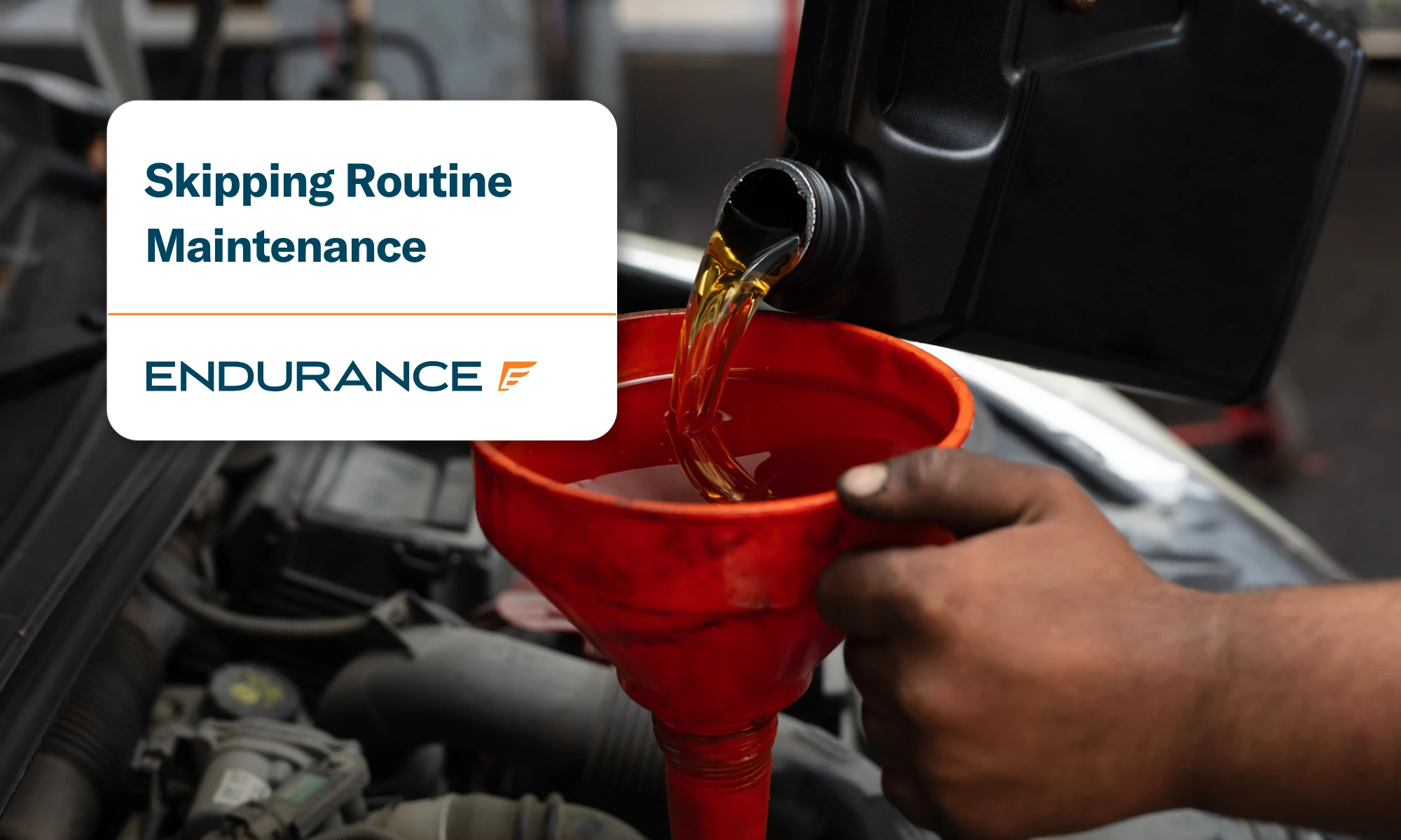 Close up of a mechanic's hands changing engine oil