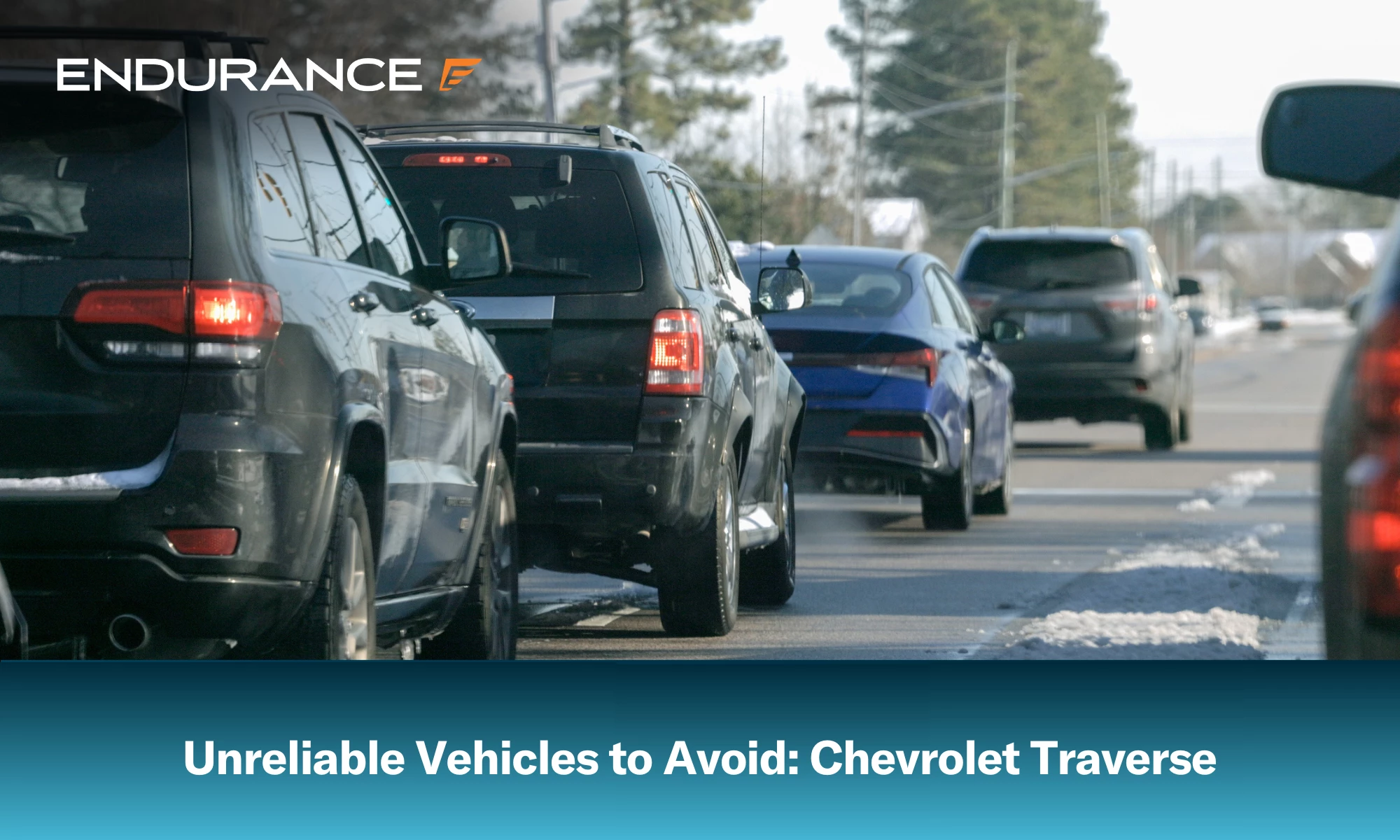 Chevrolet SUVs stopped for traffic in the snow