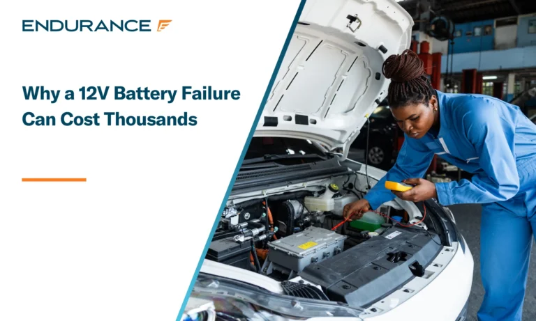 Female mechanic checking EV battery, 12V battery failure costs thousands