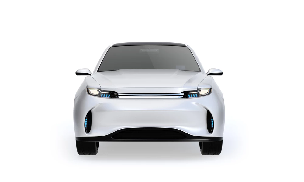 A white Tesla vehicle, electric car