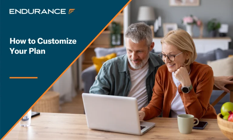 An older couple using a laptop, how to customize your Endurance protection plan